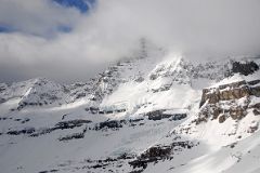 23 Mount Assiniboine With Summit In Clouds From Helicopter In Winter.jpg